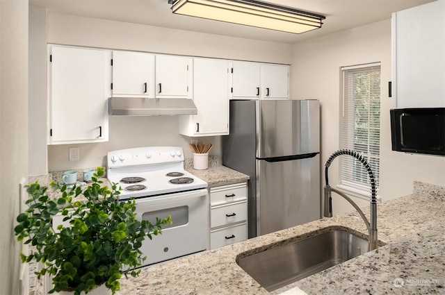 kitchen featuring stainless steel fridge, white cabinets, sink, white range with electric stovetop, and light stone counters