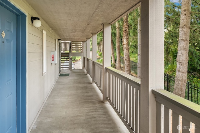 view of patio featuring a porch