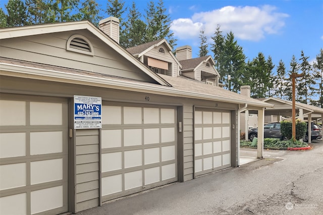 garage with a carport