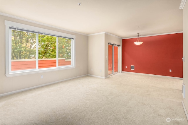 unfurnished room featuring crown molding and light colored carpet