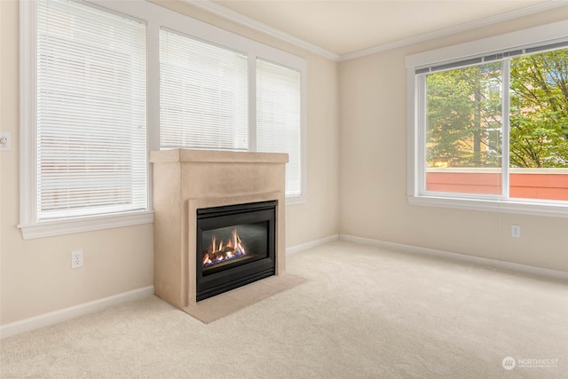 unfurnished living room featuring crown molding and light carpet