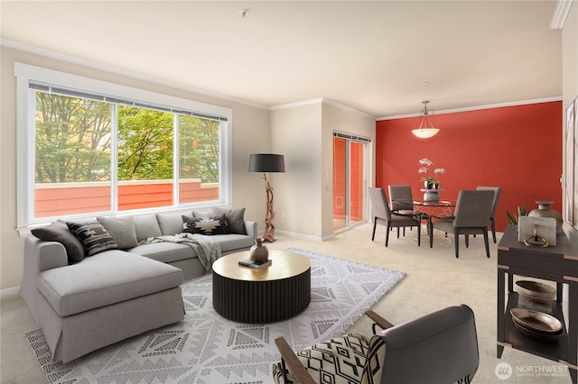 carpeted living room with ornamental molding