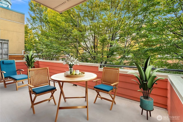 view of patio with a balcony