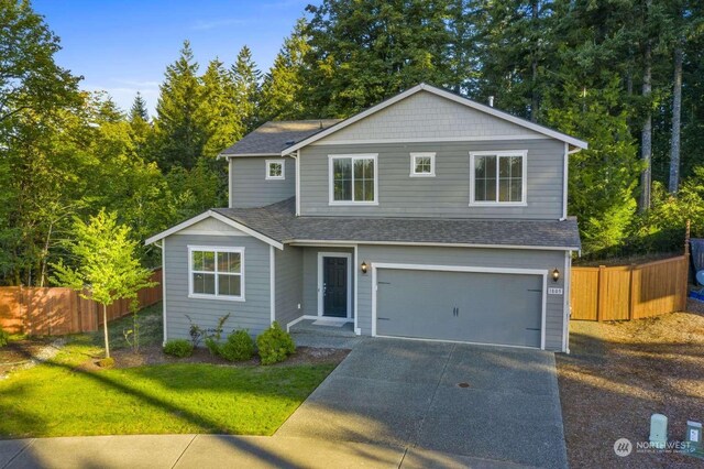 front facade with a garage