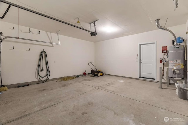 garage with a garage door opener and water heater