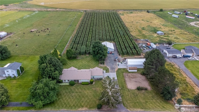 birds eye view of property featuring a rural view