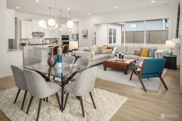 dining room with light hardwood / wood-style floors