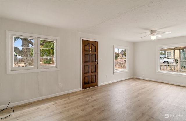 interior space featuring light hardwood / wood-style flooring, plenty of natural light, and ceiling fan