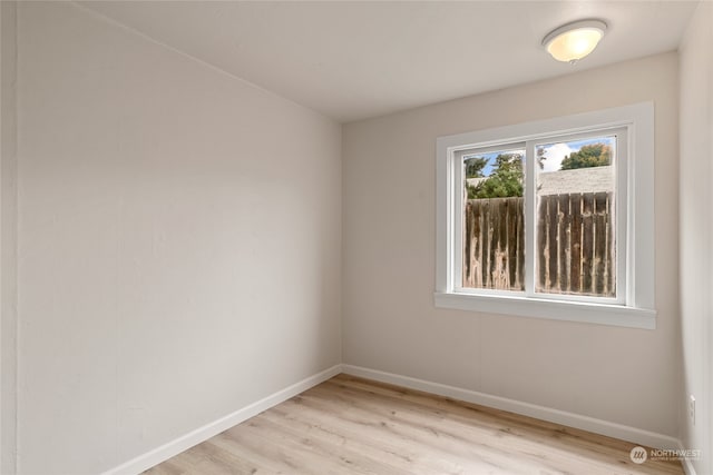 unfurnished room featuring light hardwood / wood-style flooring