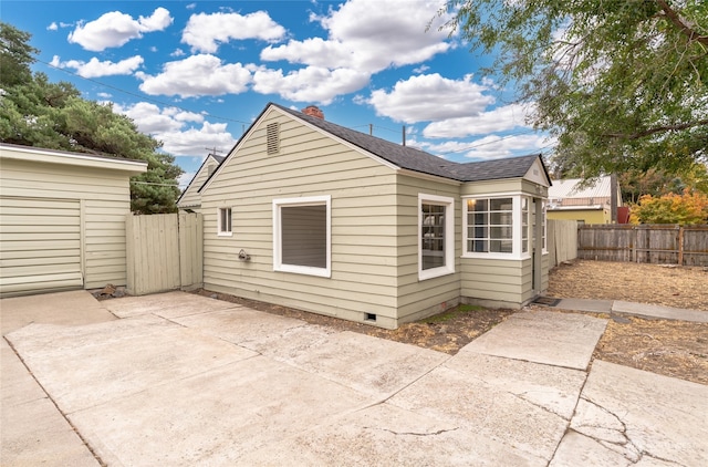 back of property featuring a patio area