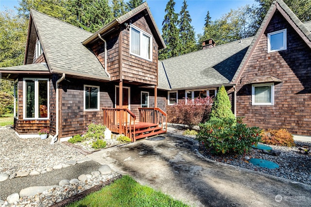 view of front of house with a wooden deck