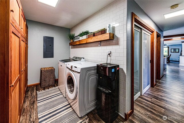 107 Dowans Creek Rd, Forks, WA 98331 - laundry area featuring electric panel, dark wood-style floors, separate washer and dryer, and baseboards