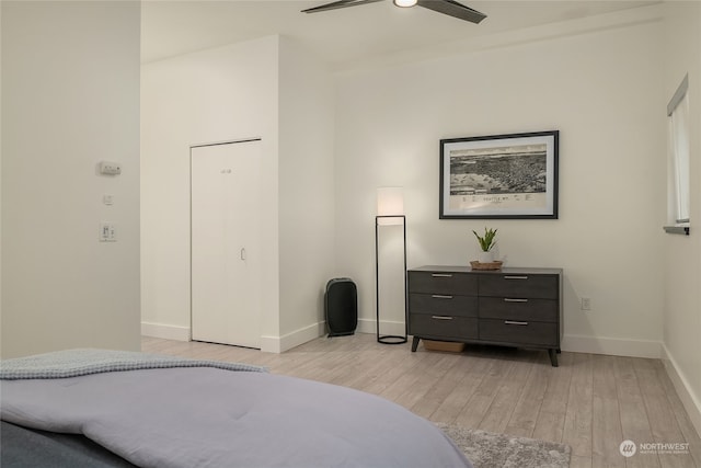 bedroom featuring light hardwood / wood-style floors and ceiling fan