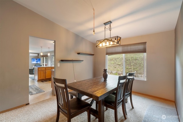 view of carpeted dining space