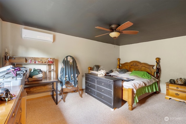 bedroom with ceiling fan, an AC wall unit, and light colored carpet