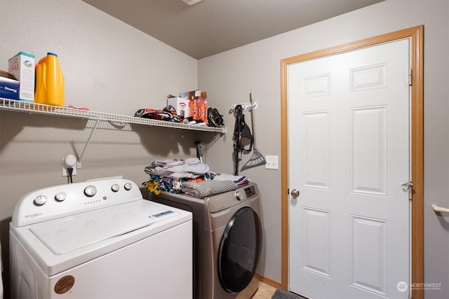 laundry room with washer and clothes dryer