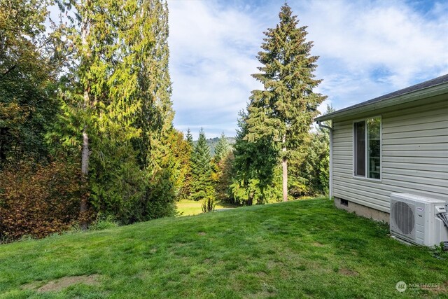 view of yard featuring ac unit