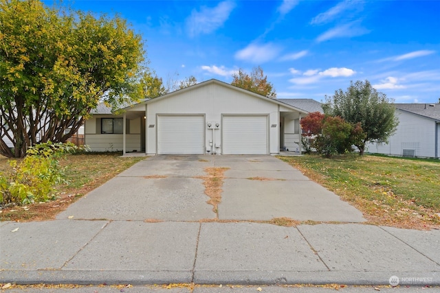 ranch-style house with a front yard and a garage