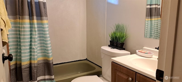 full bathroom featuring vanity, toilet, and shower / tub combo