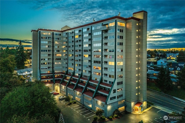 3201 Pacific Ave Unit 1201, Tacoma, WA 98418 - property at dusk with a view of apartment building / complex
