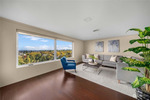 3201 Pacific Ave Unit 1201, Tacoma, WA 98418 - living room featuring baseboards and wood finished floors