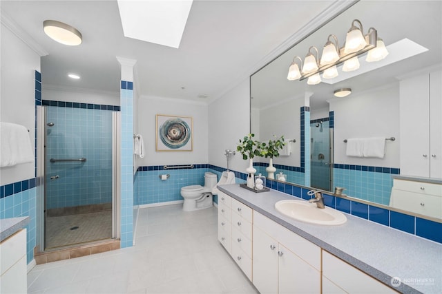 3201 Pacific Ave Unit 1201, Tacoma, WA 98418 - bathroom with tile walls, ornamental molding, tile patterned floors, a shower stall, and a skylight