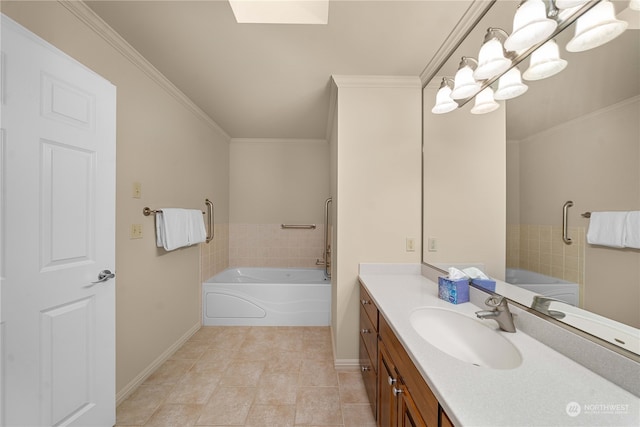 bathroom featuring a skylight, tile patterned floors, a bathing tub, vanity, and ornamental molding