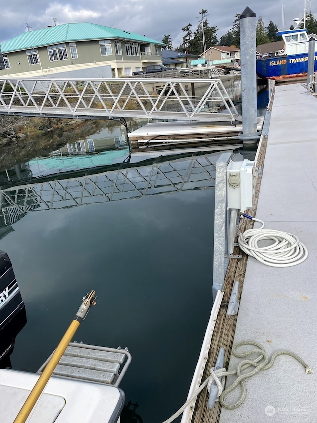 view of dock with a water view