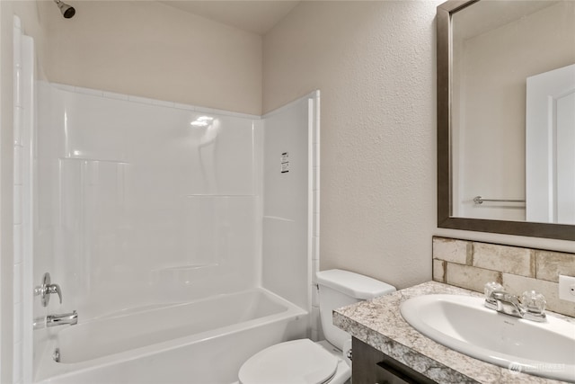 full bathroom with vanity, bathtub / shower combination, and toilet