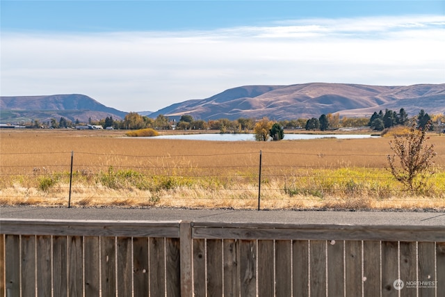 mountain view with a water view and a rural view