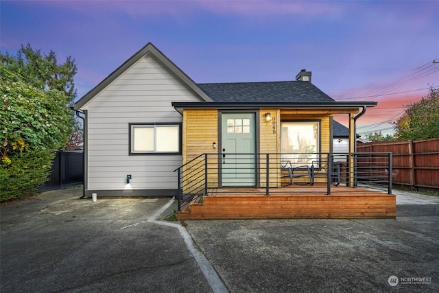 view of front of house with a deck