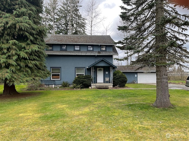 view of front facade with a front yard