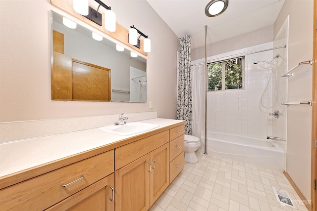 full bathroom featuring shower / bath combo with shower curtain, vanity, and toilet