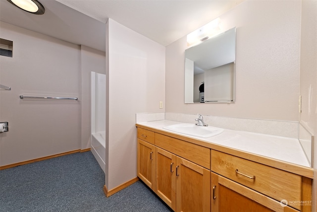 bathroom with vanity and separate shower and tub