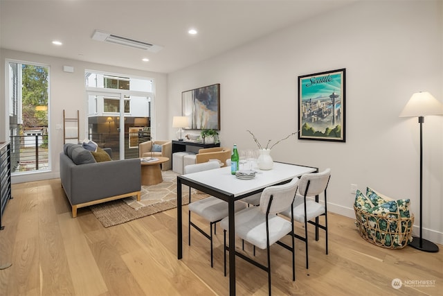 dining area featuring light hardwood / wood-style floors