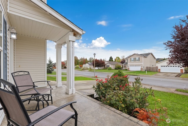 view of patio featuring a garage