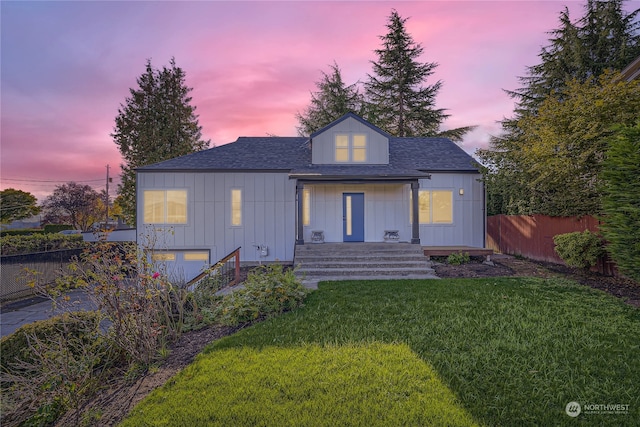 view of front of home featuring a yard