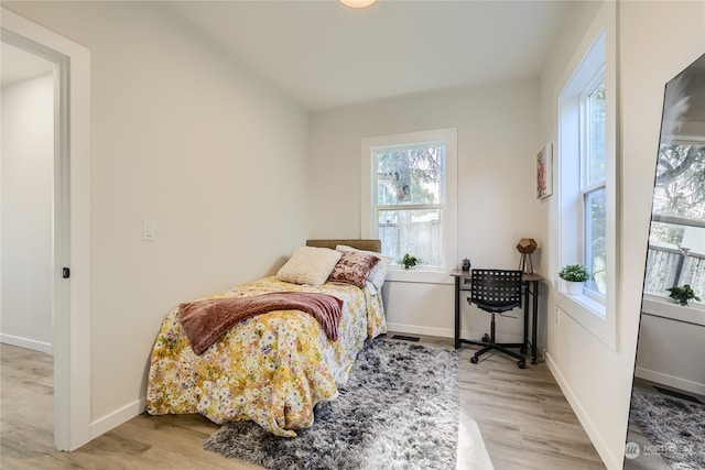 bedroom featuring light hardwood / wood-style flooring