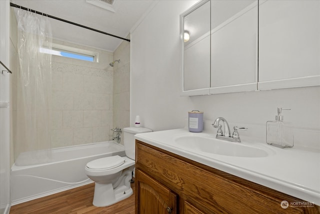 full bathroom with hardwood / wood-style flooring, vanity, toilet, and shower / bathtub combination with curtain