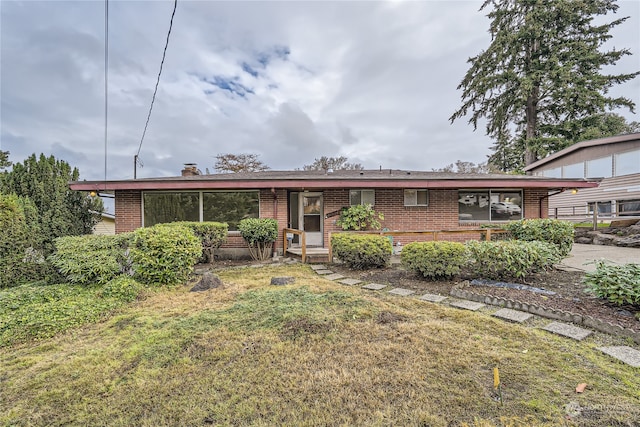 view of front of home with a front yard