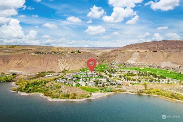 aerial view with a water and mountain view