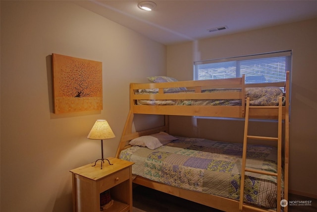 bedroom with visible vents
