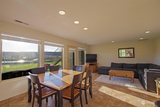 dining area featuring tile patterned floors, visible vents, and recessed lighting