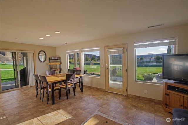 dining room with plenty of natural light