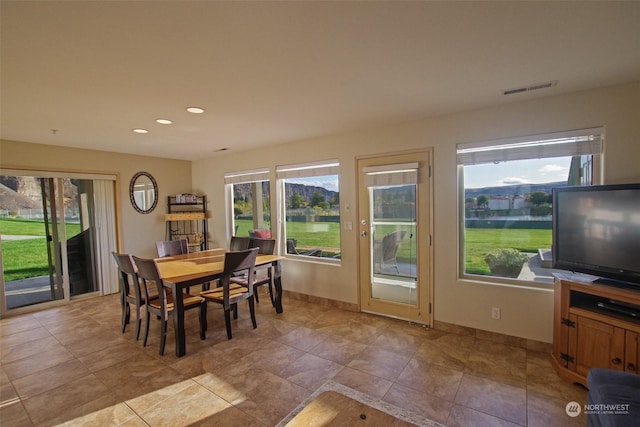 dining area with recessed lighting, baseboards, visible vents, and a wealth of natural light