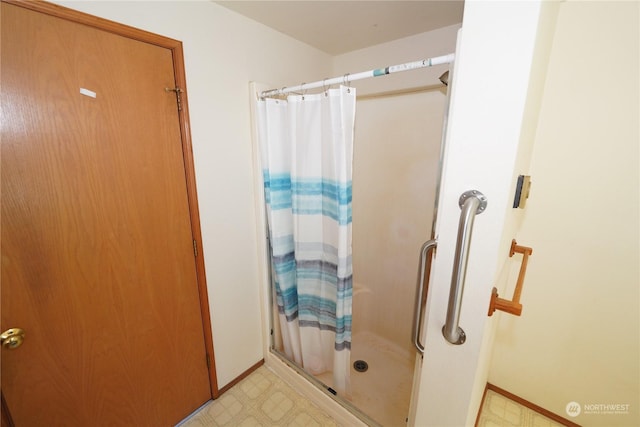 15614 Birch St, Long Beach, WA 98631 - full bath with tile patterned floors, baseboards, and a shower stall