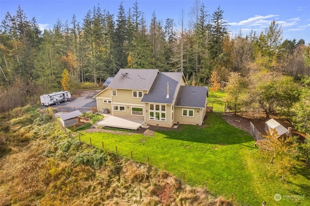 bird's eye view featuring a forest view