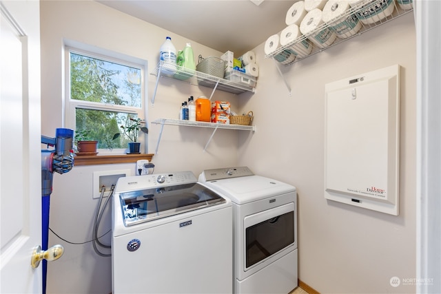 laundry room featuring washer and clothes dryer