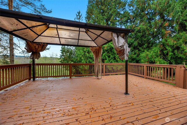 wooden deck with a gazebo