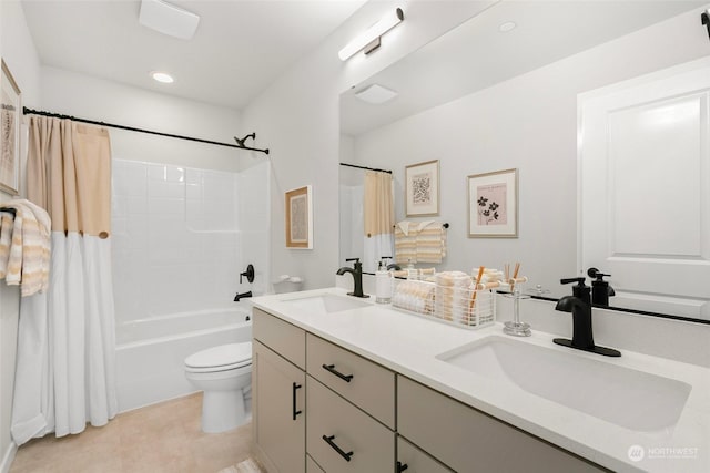 full bathroom featuring shower / bath combo, vanity, toilet, and tile patterned floors